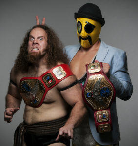 Hobo (R) finally got Jervis Cottonbelly (L) to conquer his fear of the top rope. Can The Friendship Express be stopped now?